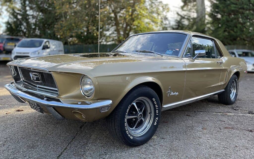 Vintage Ford Mustang car in excellent condition, ready for accident repair services.